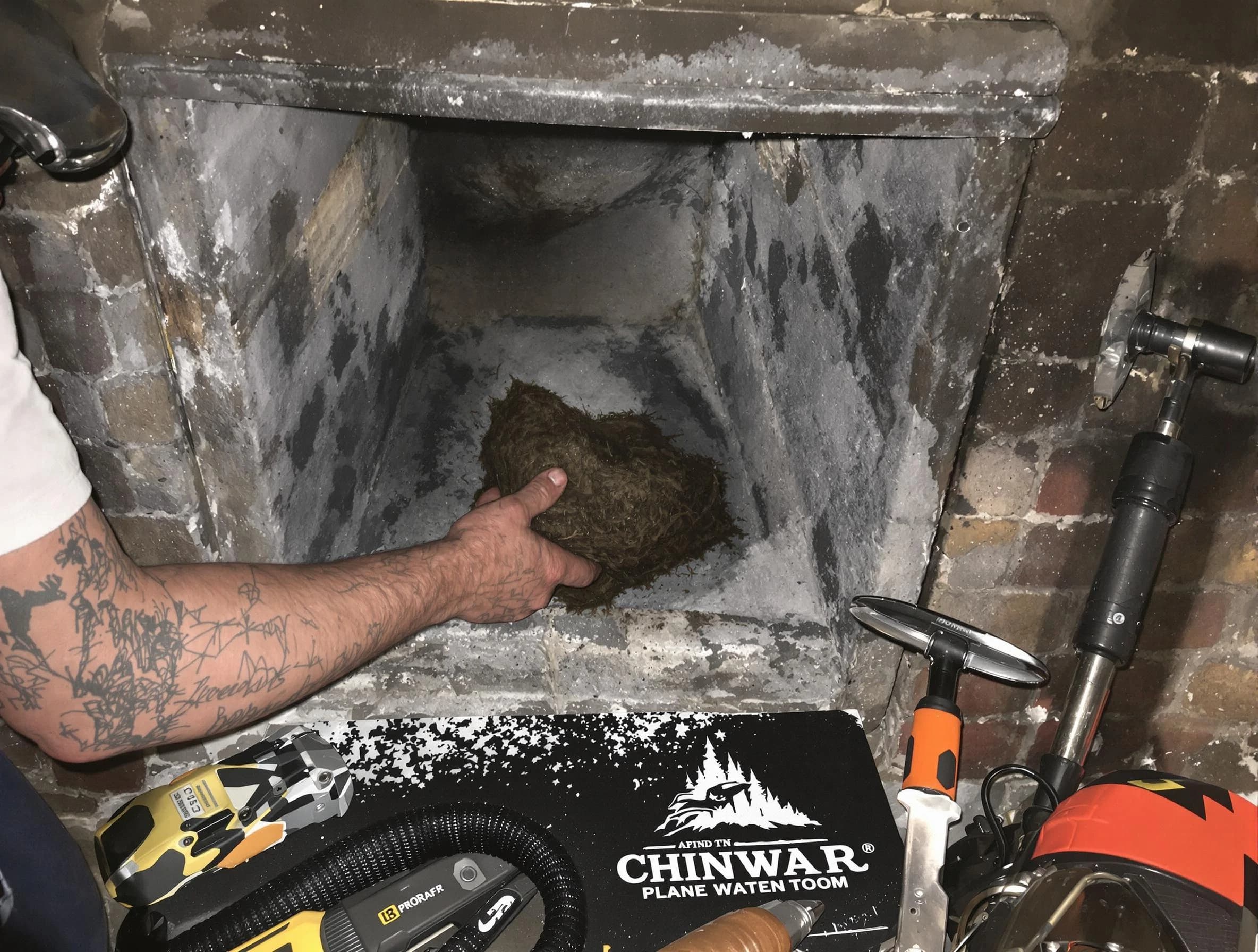 Murrysville Chimney Sweep safely removing debris and screening chimney in Murrysville, PA